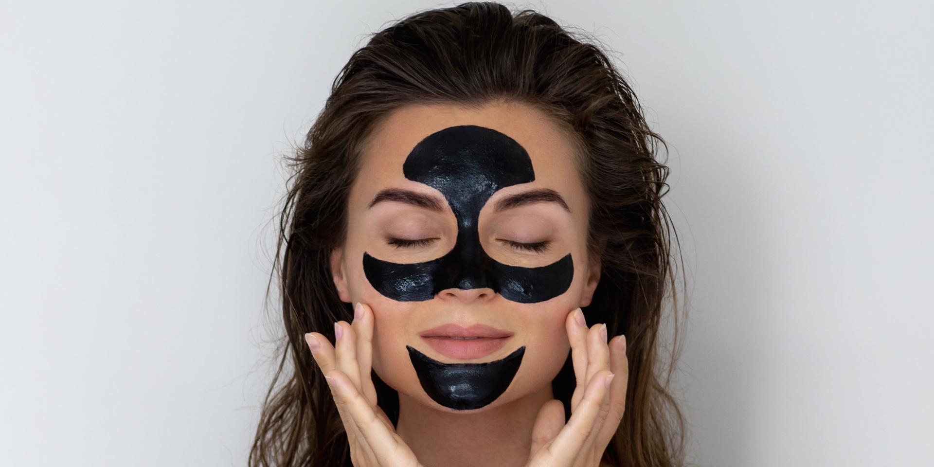 Woman. applying a mask
